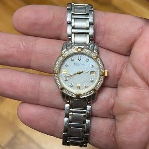 Bulova gold and diamond watch
